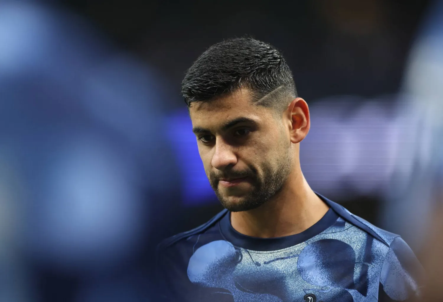 Cristian Romero con la camiseta del Atlético de Madrid