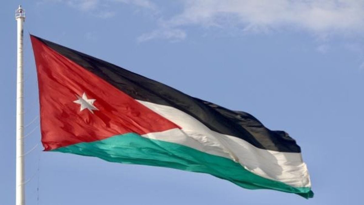Jordanian and Saudi flags displayed together