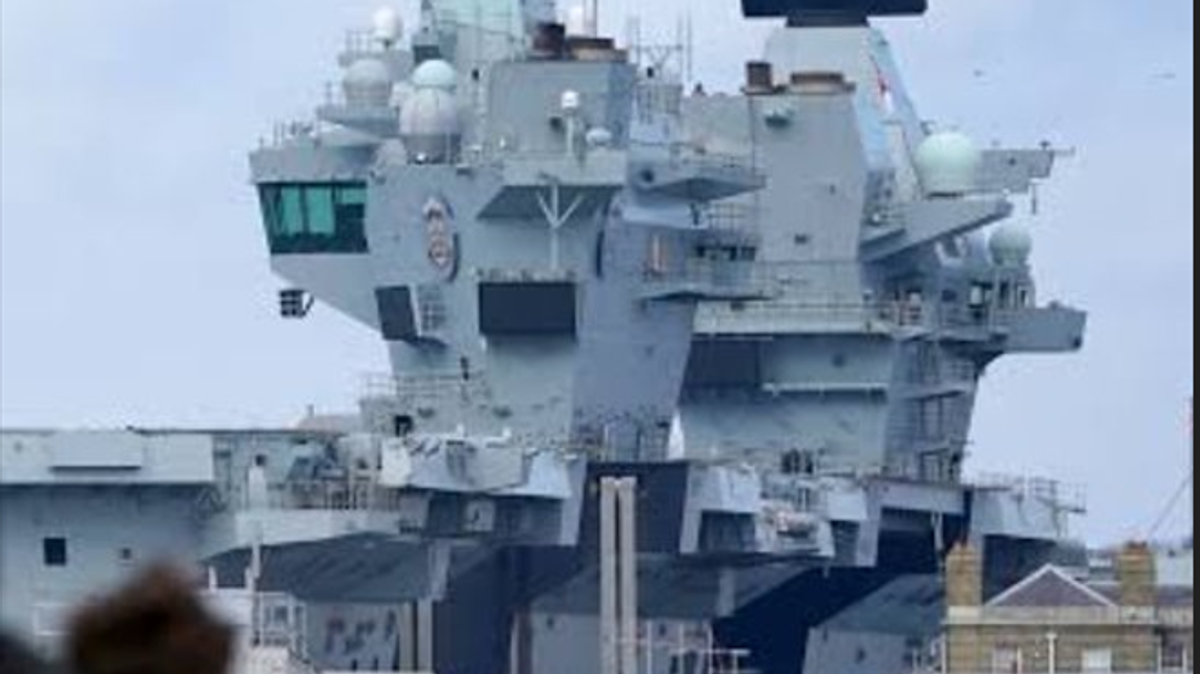 HMS Prince of Wales aircraft carrier departing Portsmouth