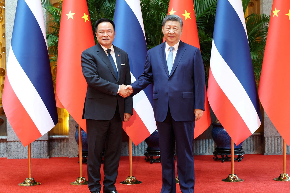 Thai prime minister surprises Chinese counterpart with Taiwanese love song in Beijing