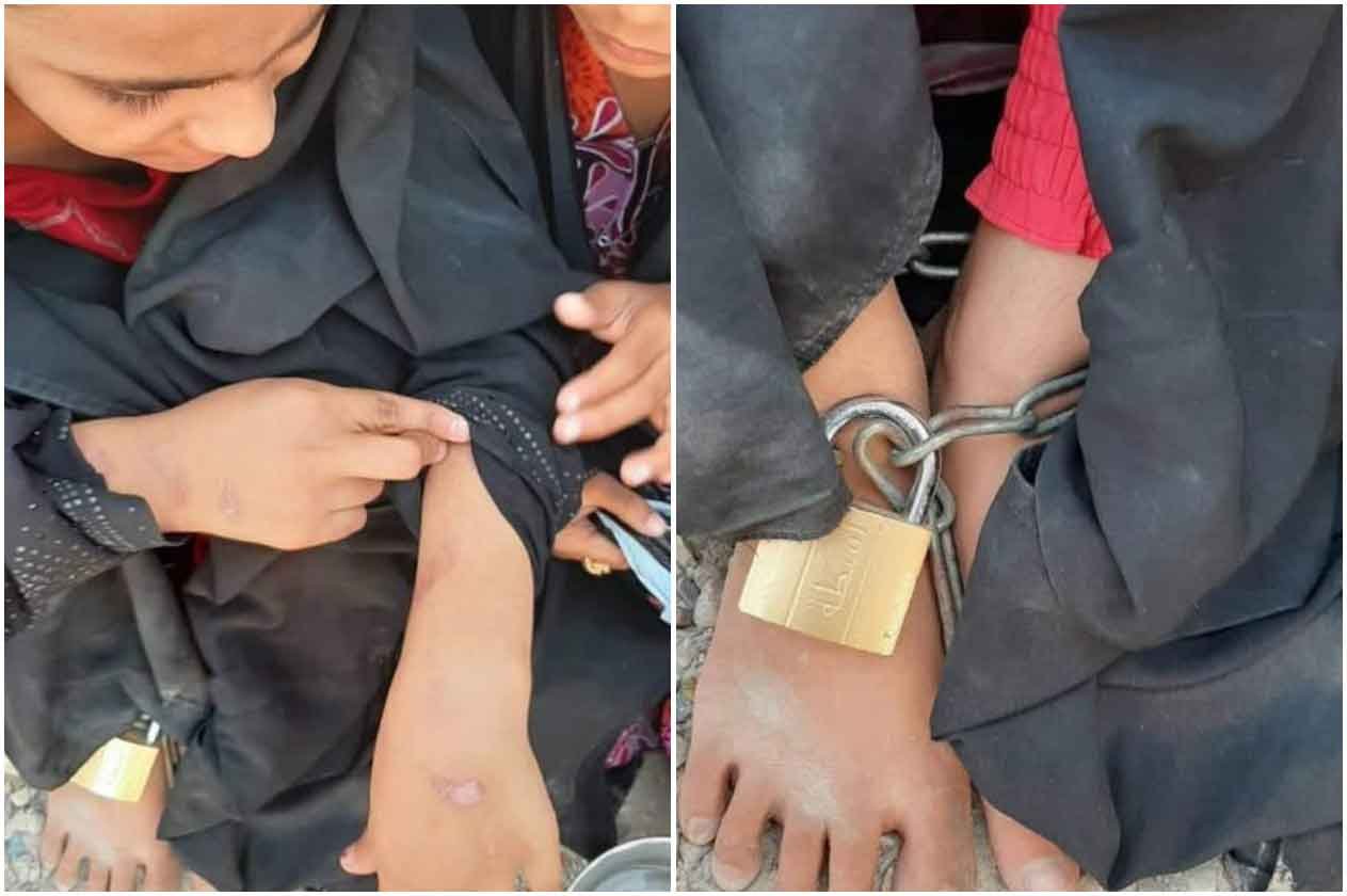 بالصور.. أب يعذب طفلتيه ويرميهما مقيدتين بالأغلال على قارعة الطريق بالعراق